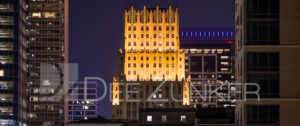 Elevated Twilight image of the Gulf Building in Downtown Houston showing art-deco architectural features