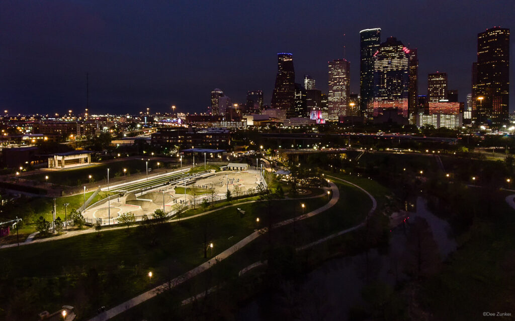 Downtown Houston and Jamail Skate Partk at Night " photo by Houston Aerial Photographer Dee Zunker  JamalSkatePark-Gandy2Design-001.psd  Houston Commercial Architectural Photographer Dee Zunker