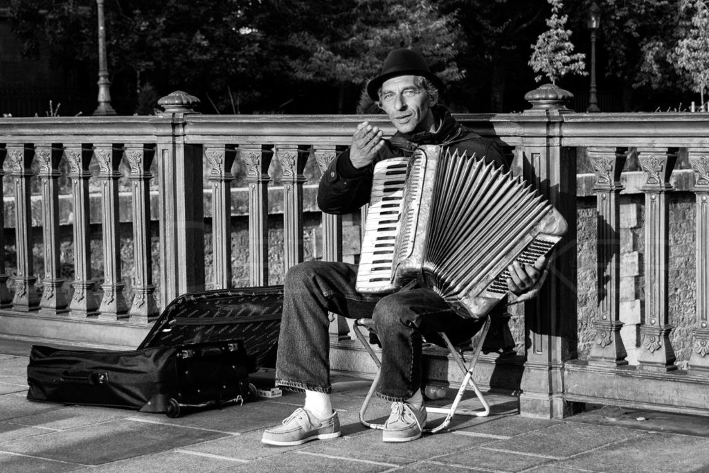 Accordian Player - Blow Me a Kiss  Paris_Street_10-Edit-Edit-Edit.psd  Houston Commercial Architectural Photographer Dee Zunker