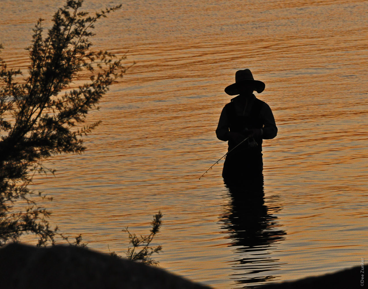 Fisherman Silhouette at Sunset Galveston Texas Sea Wolf Park Houston Commercial Photographer Dee Zunker