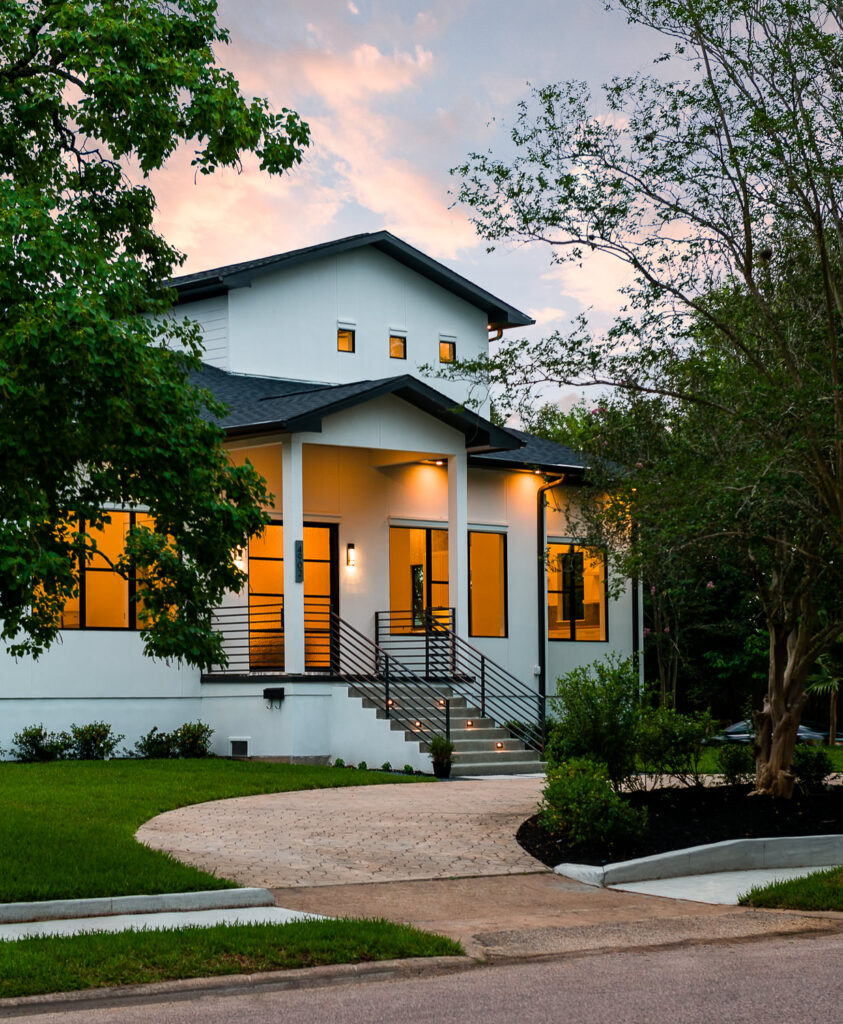 Custom luxury home exterior twilight architectural photography Bellaire Texas by Arieli Builders