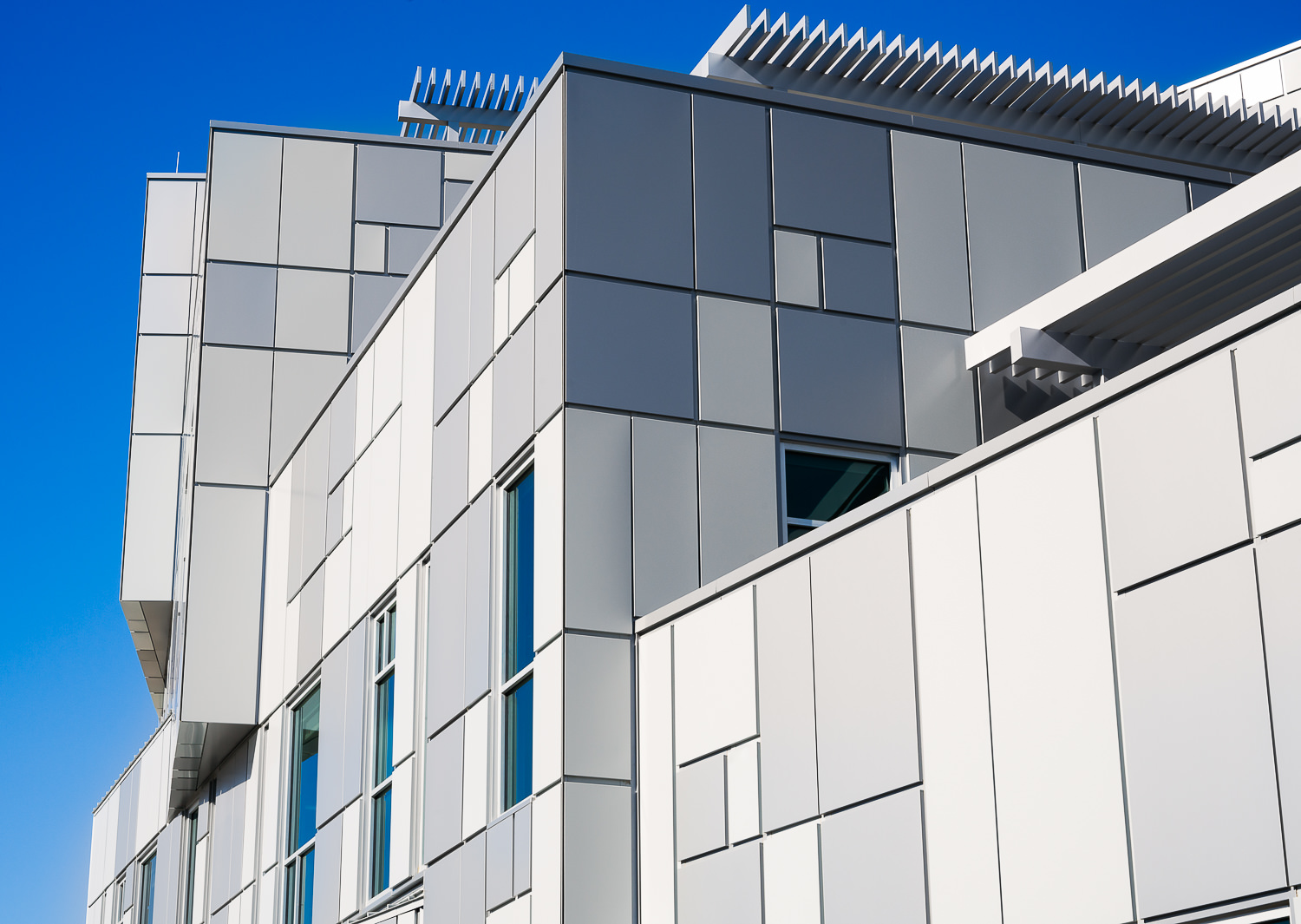 Architectural Product photo of detail of metal panels used on the side of a new school building