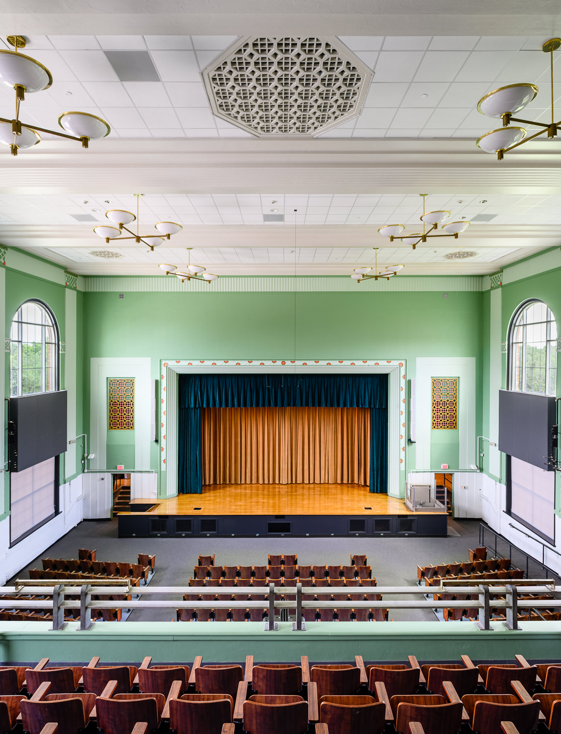 Interiors Photography of   the renovated auditorium in historic Austin High School in Houston TX. 