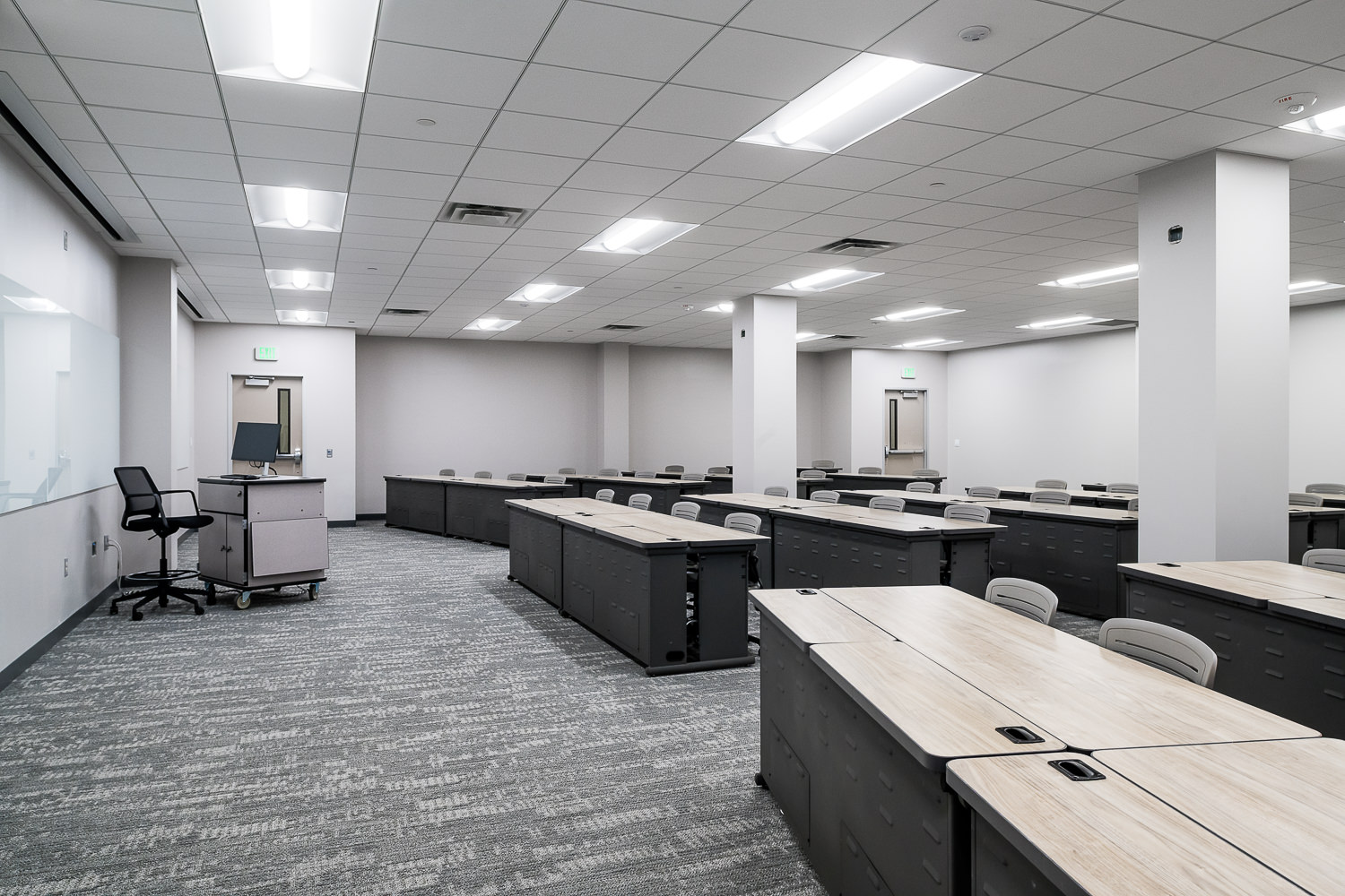 Interior photo of a tiered lecture hall in the Lee College Nursing School, showcasing modern institutional and educational architecture in Baytown, TX.