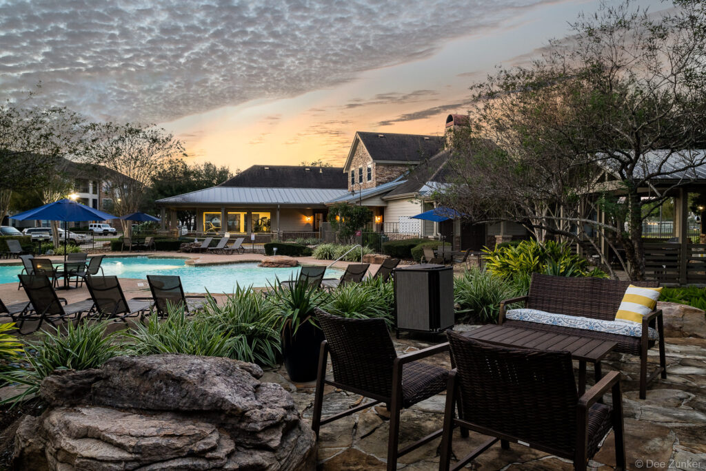 Ranch City Park apartments pool area twilight aerial photography Pearland Texas multifamily residential amenities exterior