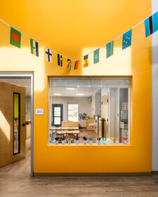 Interiors photo of kla school with bright yellow and sunlight