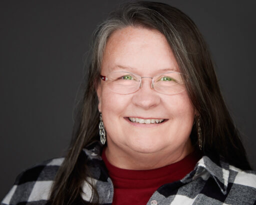 Dee_0030.jpg Professional Headshot of Commercial Photographer Dee Zunker in a white and black flannel shirt over a red shirt. Houston Commercial Architectural Photographer Dee Zunker