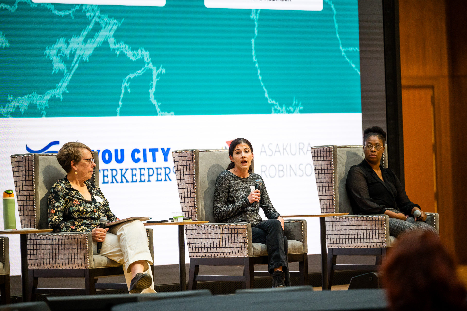 Panel discussion at Gulf Coast Green conference with Houston environmental leaders on stage