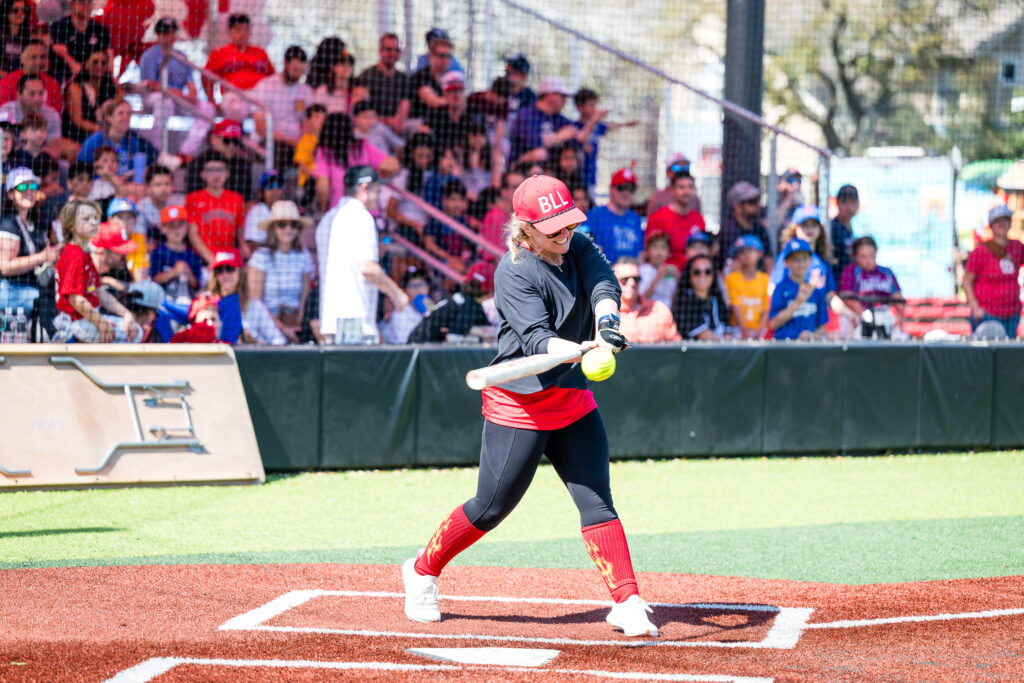 Mom's Softball red team batter during the Bellaire Little League Opening Day 2026