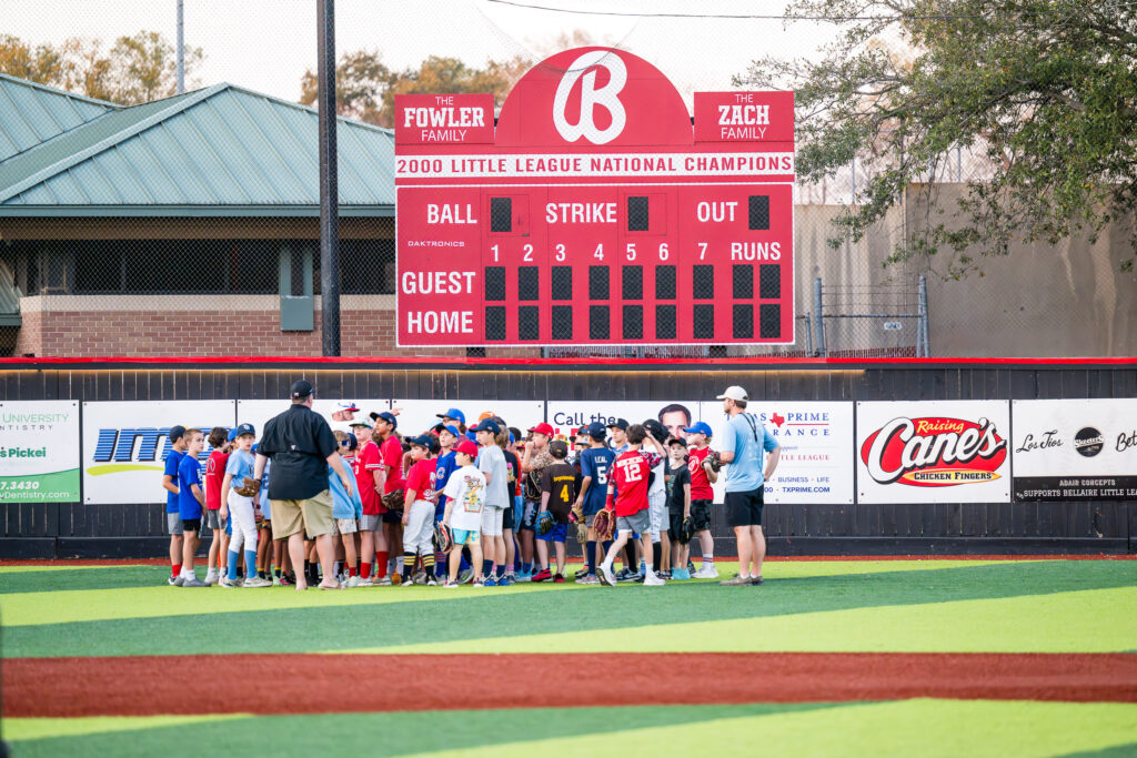 Younger players are getting ready to shag balls during the Home Run Derby on Opening Day for Bellaire Little League on February 28, 2026.