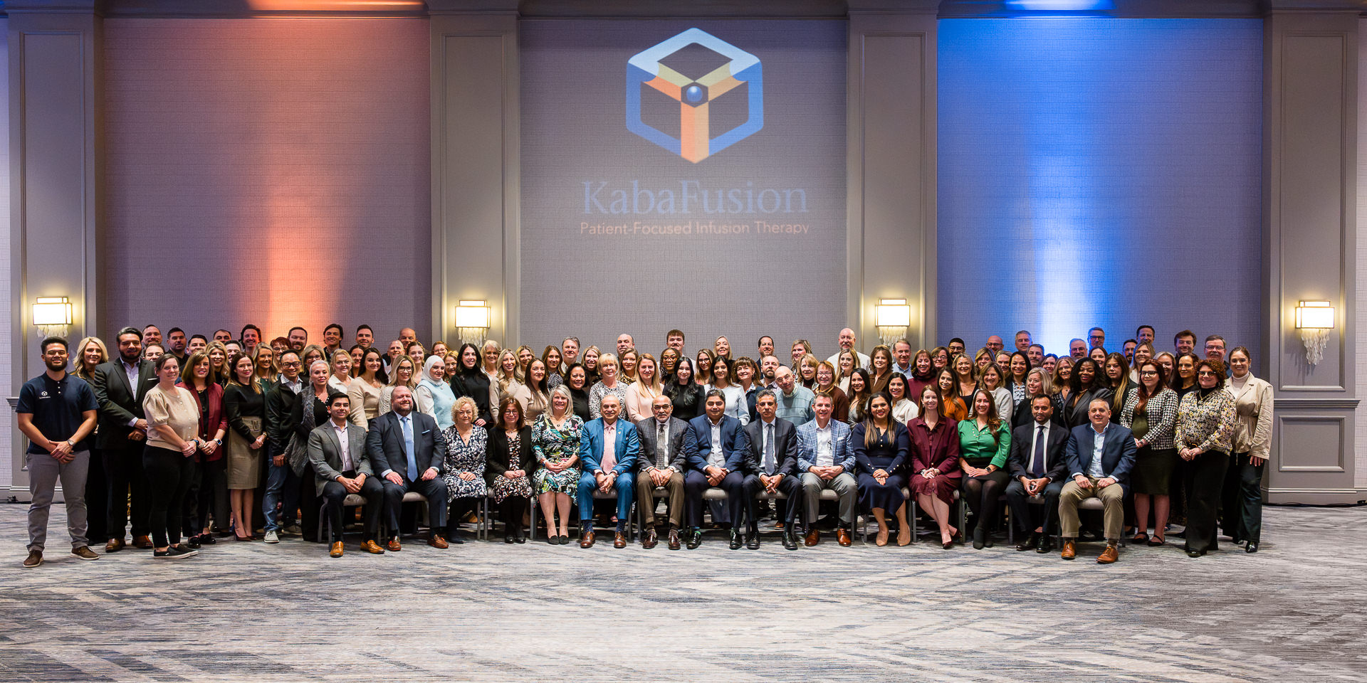 Large group photo of conference attendees at Houston corporate event
