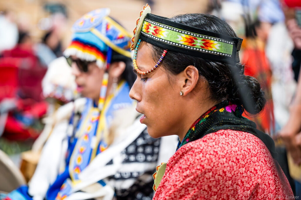 Native American women in traditional beaded regalia at the Alabama-Coushatta 56th Annual Powwow, Texas, photographed by Dee Zunker Photography.