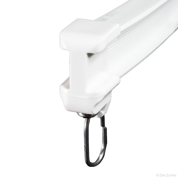 Close-up product photo of a white plastic curtain track glider with a stainless steel hook on white background.