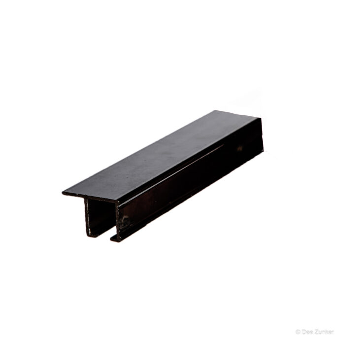 Dark bronze anodized aluminum H-channel extrusion profile on white background, Houston industrial catalog product photography by Dee Zunker.