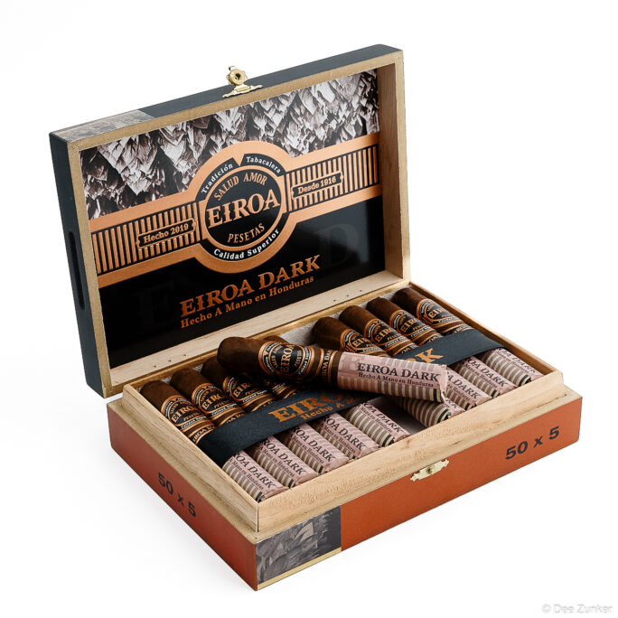 Open wooden box of Eiroa Dark handmade Honduras cigars, 50x5 count, product photography on white background by Houston studio.