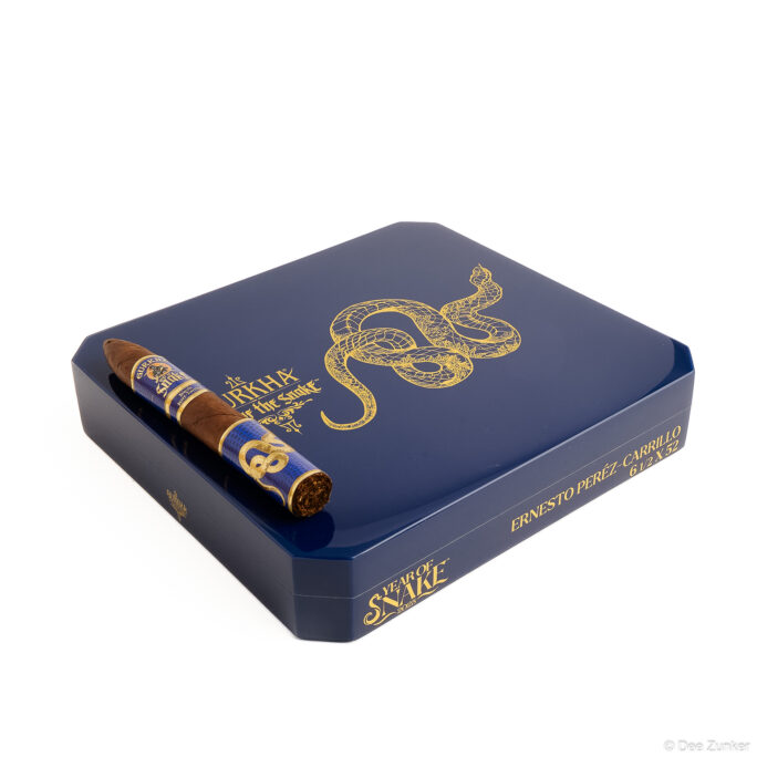 Gurkha Year of the Snake 2025 luxury cigar box with gold snake design and single cigar, retail product photography on white background.