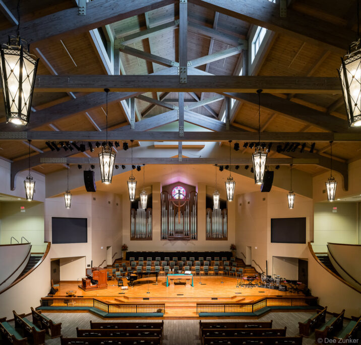 View from the second level of the Friendswood United Methodist Church sanctuary, highlighting the interior architecture of the community worship hall.