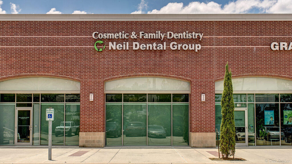 Brick exterior facade of a cosmetic and family dental office in The Woodlands TX commercial architecture photography