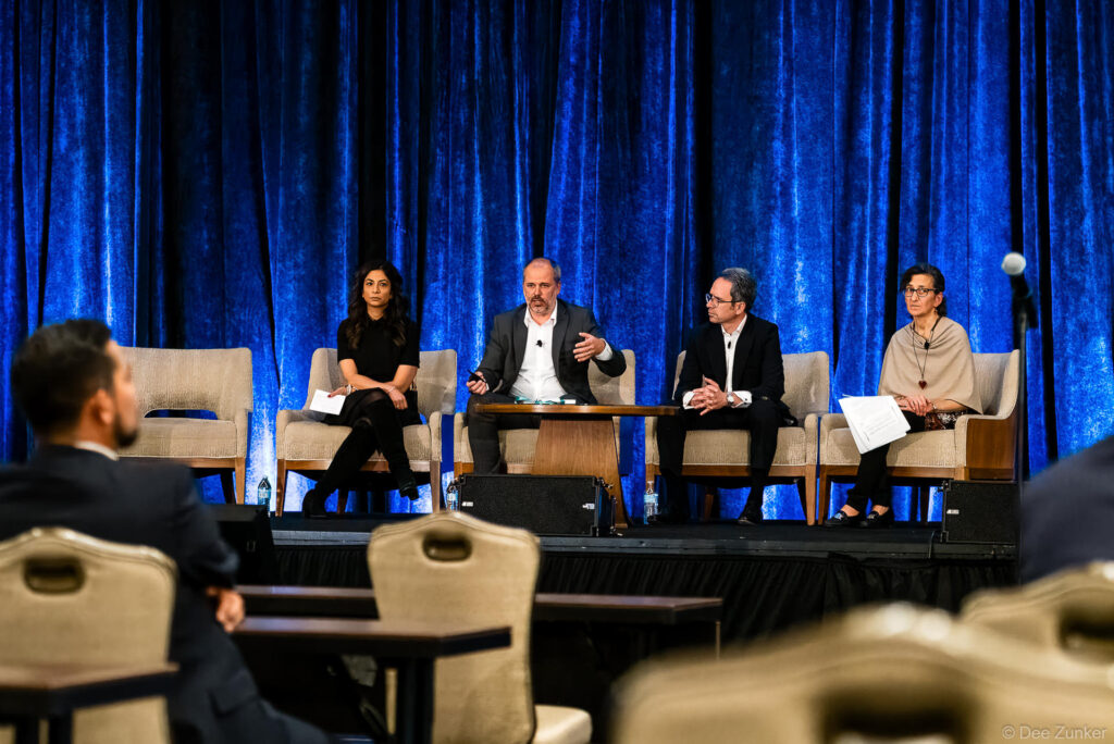 Four panelists seated on stage at INTA Leadership Meeting Houston discussing brand restrictions at a professional conference event.